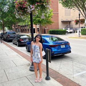 selling this super cute blue and white mini dress bought from boutique